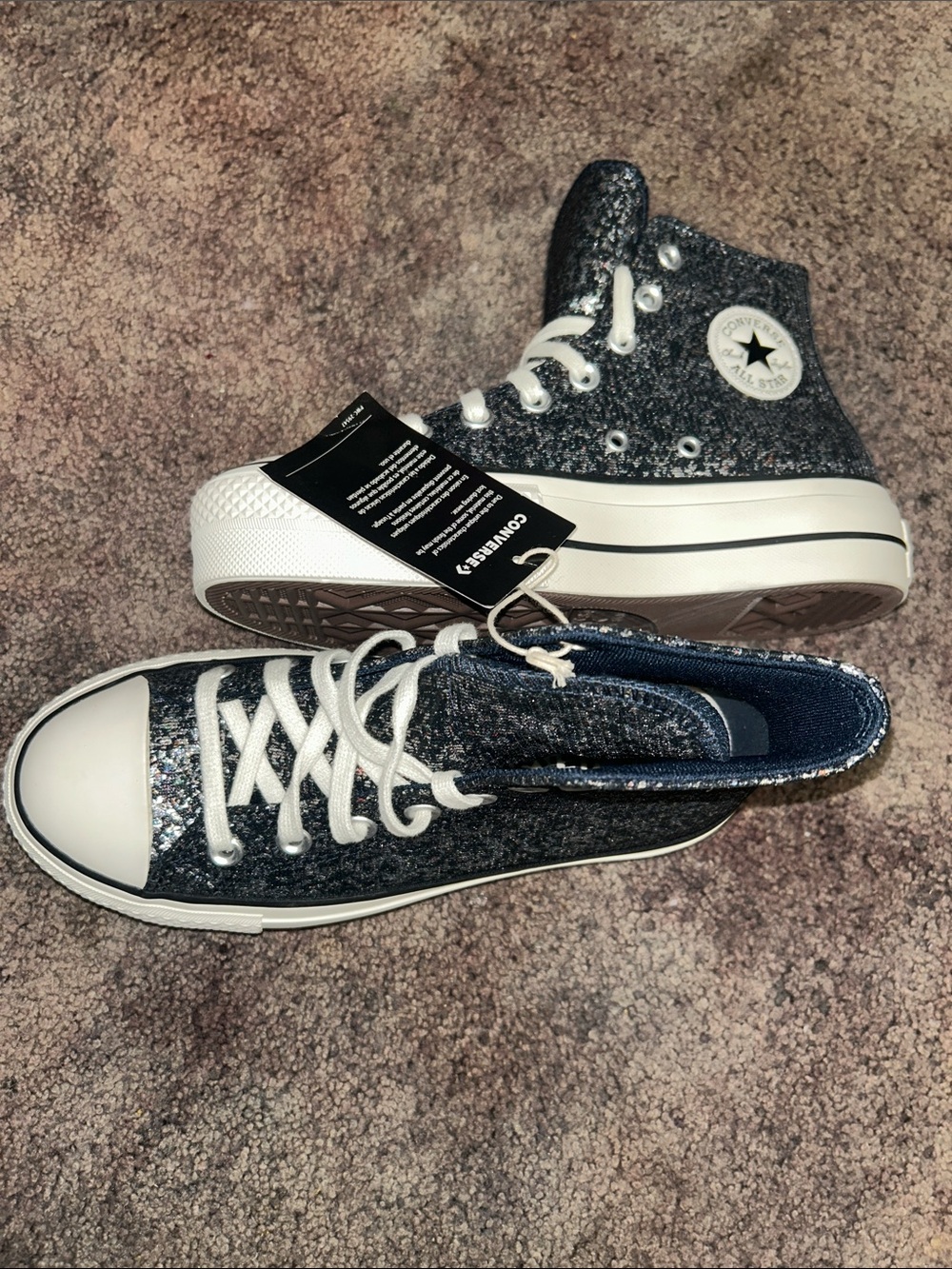 Converse women’s black Glitter High Top Sneakers
